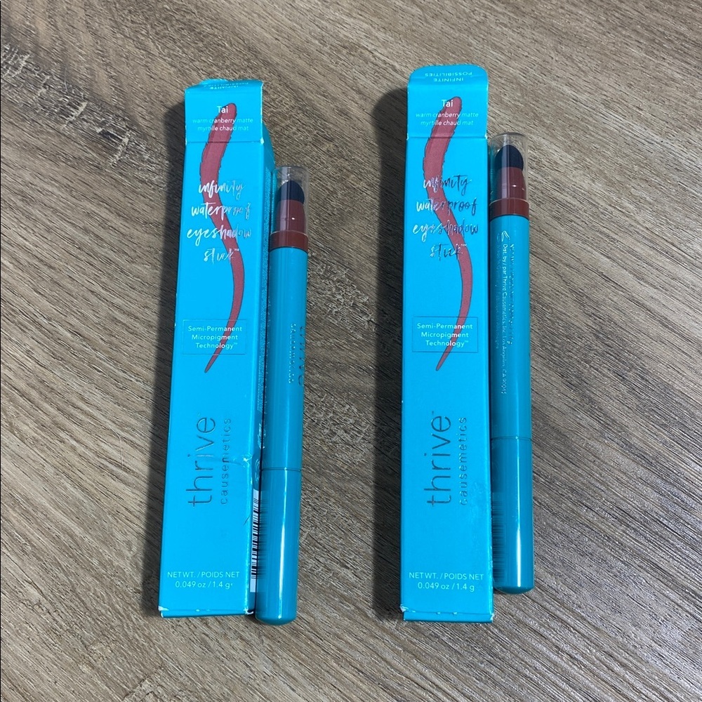 2 Thrive Causemetics Eyeshadow Sticks in Tai warm cranberry matte